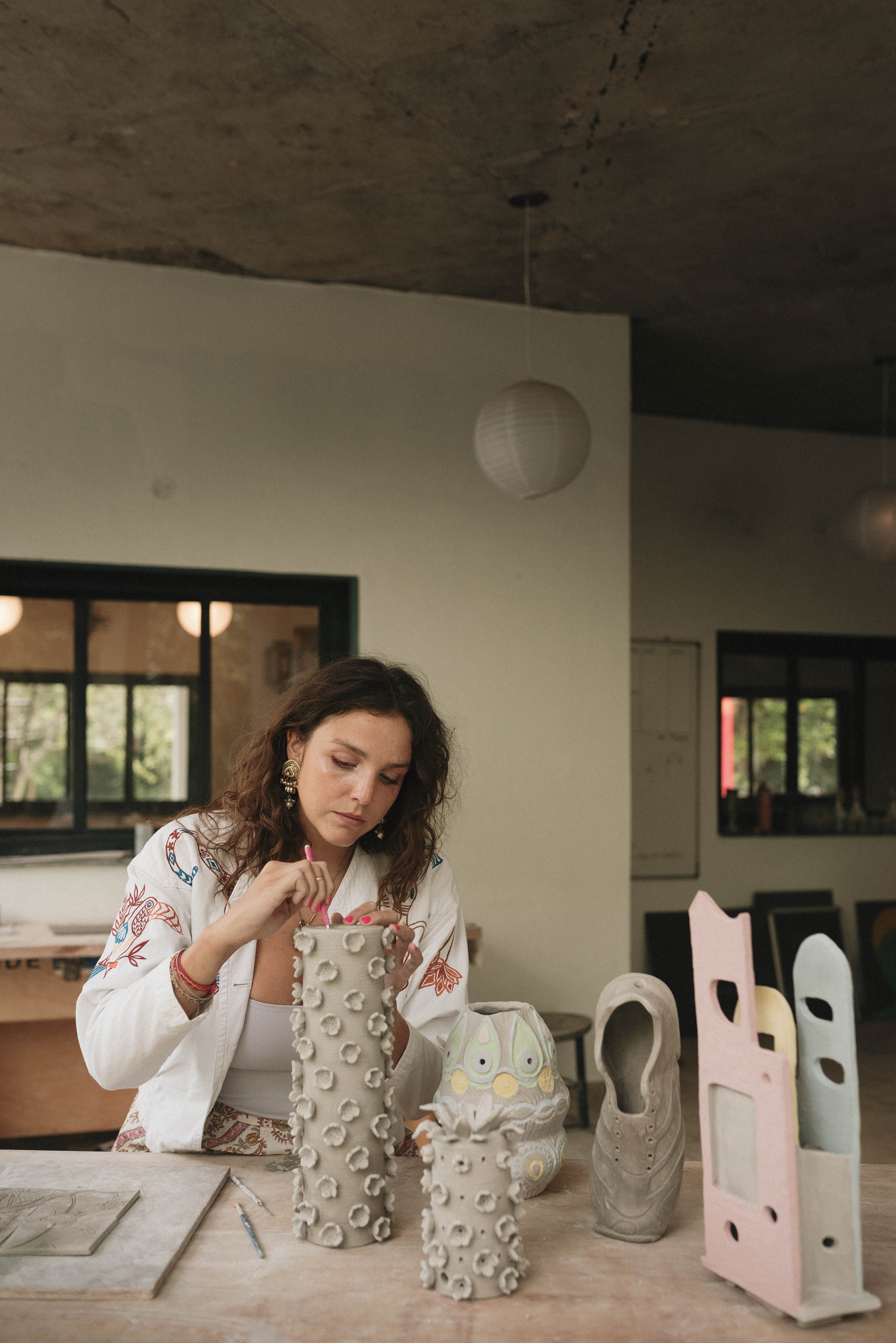 Handmade carved ceramic tiles by Isabel Kennedy Fishy Ceramics Mumbai